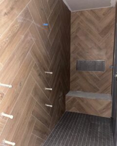 Herringbone Bathroom - Cornerstone Flooring Winter Park